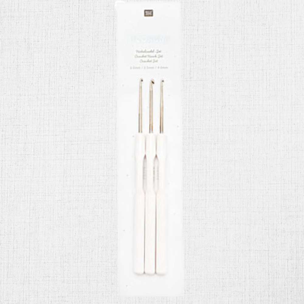 Trio of metal hooks with plastic handle by Rico